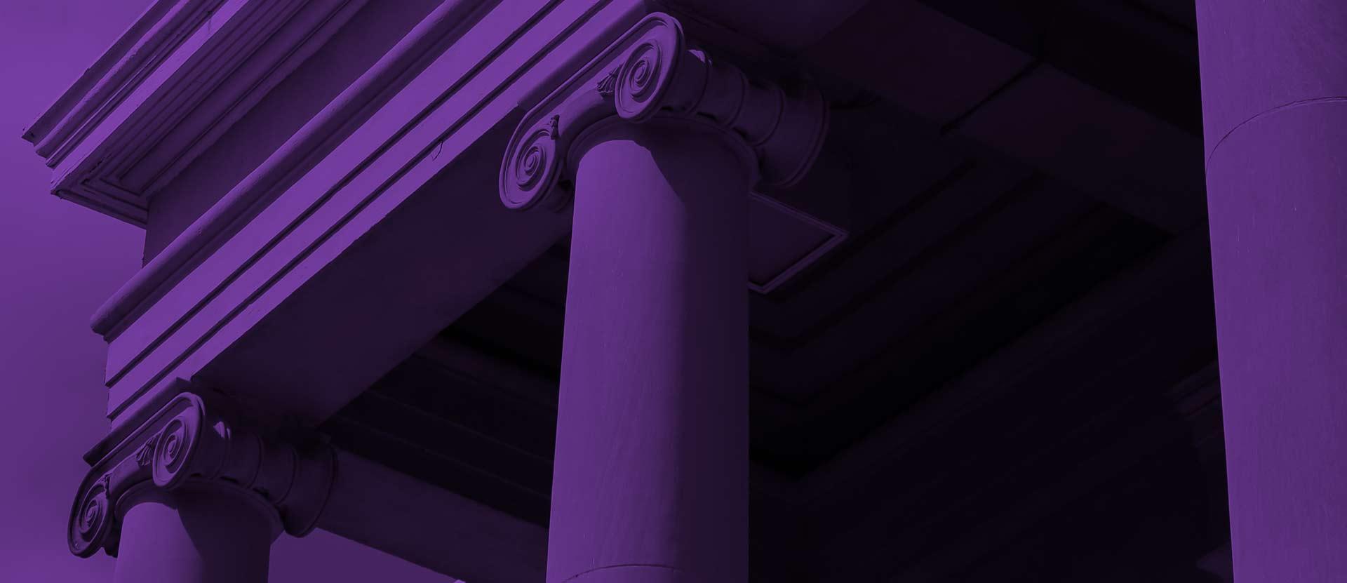 Columns of Candler building with purple overlay.